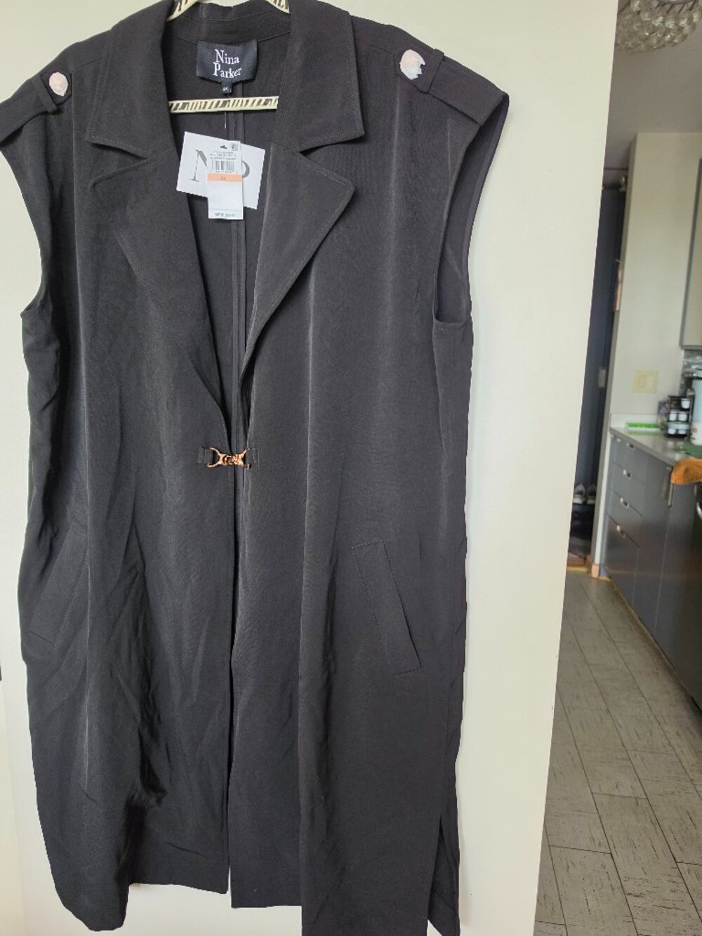 Nina Parker Clasp-Front Duster Vest in black. Size 2X